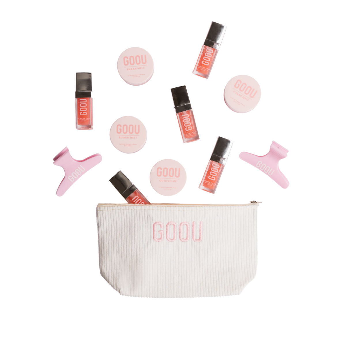 Goou Beauty cosmetic makeup beauty travel bag in white with pink logo featuring lip oil gloss, lip scrub, lip balm mask and pink hair clip grip on white background