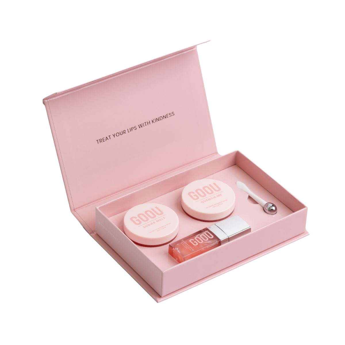 Goou beauty lip care lip kit with pink box packaging including a lip oil, lip scrub and lip mask balm on white background