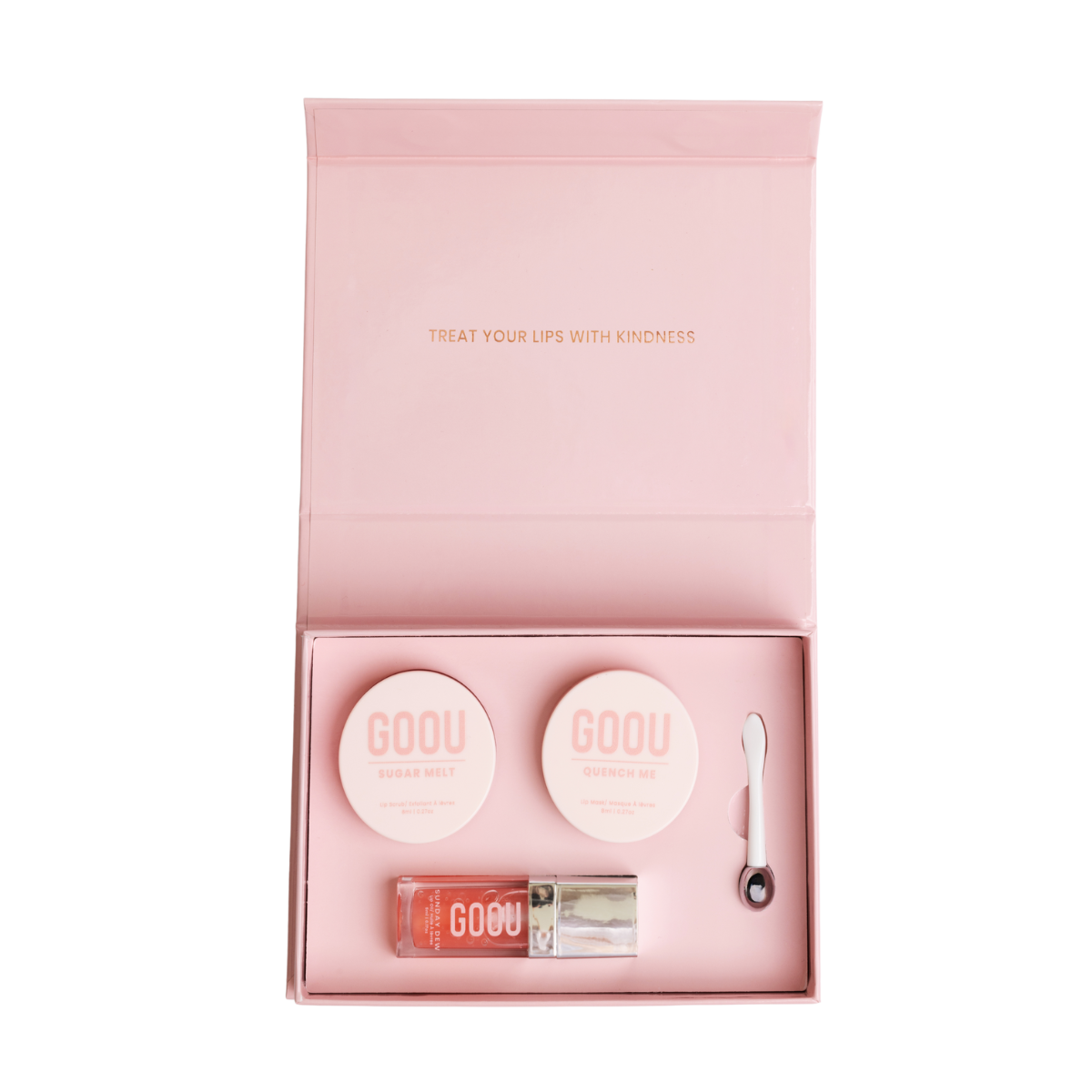 Goou beauty lip care lip kit with pink box packaging including a lip oil, lip scrub and lip mask balm on white background