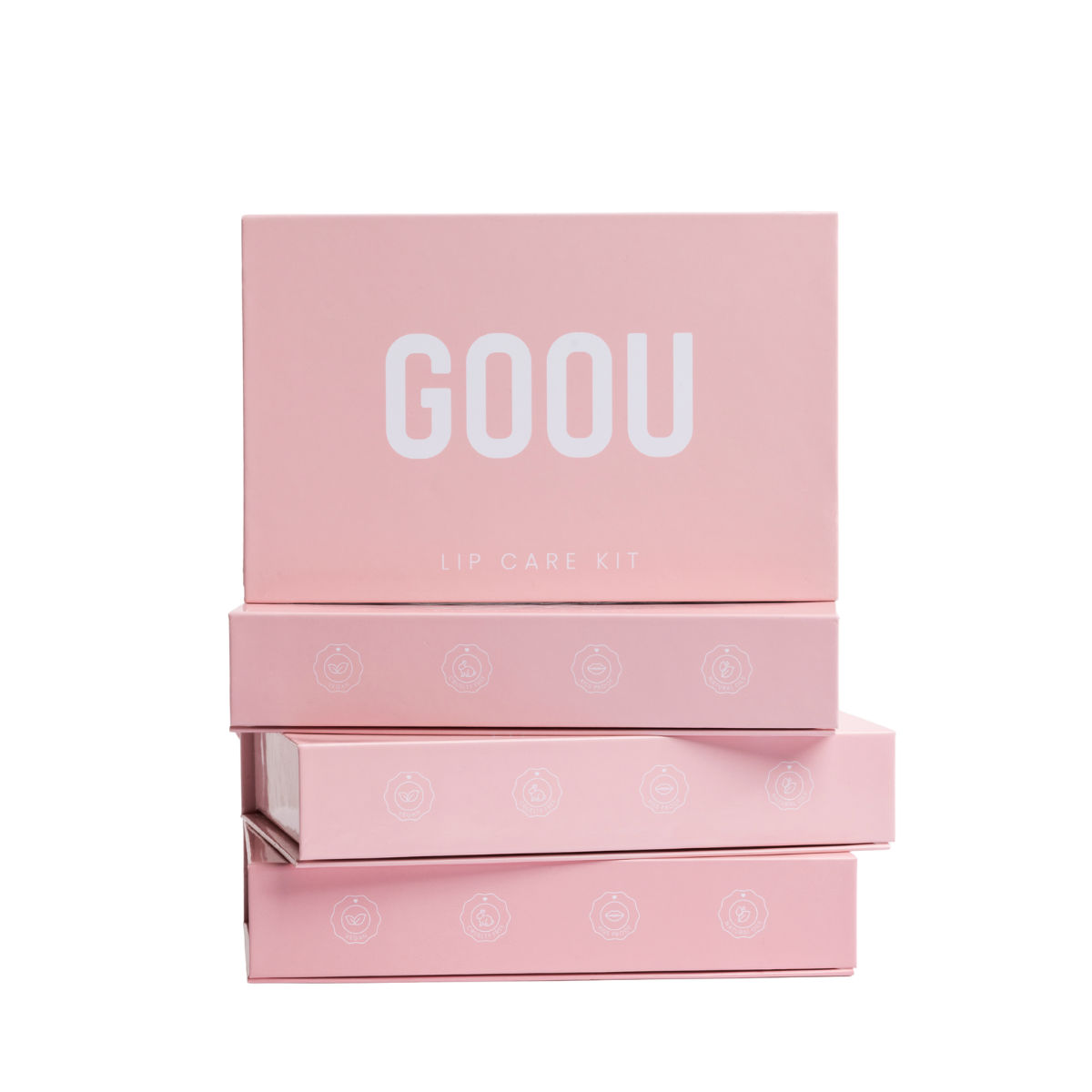 Goou beauty lip care lip kit pink box packaging including a lip oil, lip scrub and lip mask balm