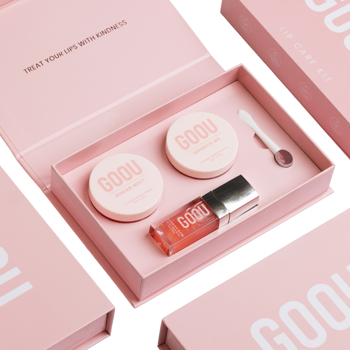 Goou beauty lip care lip kit with pink box packaging including a lip oil, lip scrub and lip mask balm