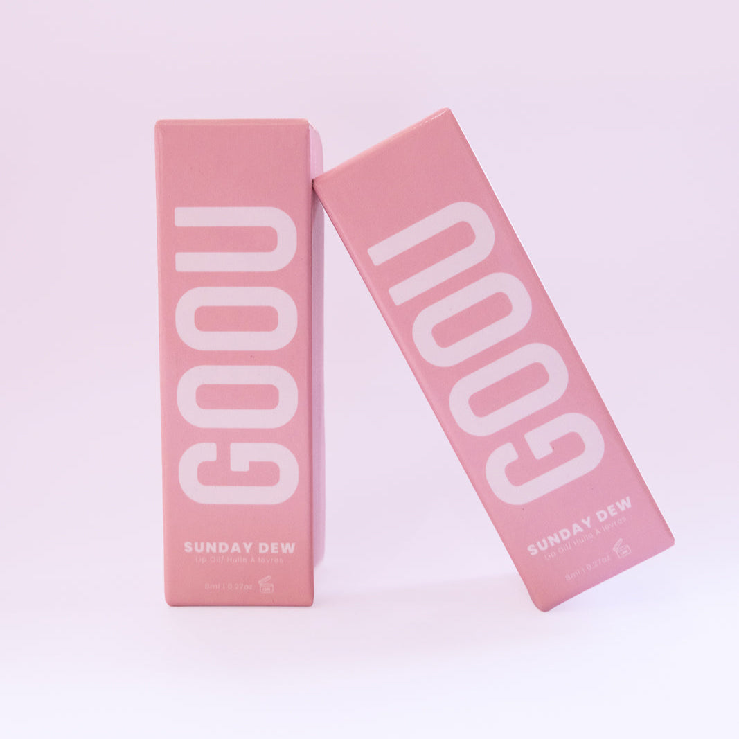 Two GOOU Beauty Sunday dew lip oil gloss with pink packaging on a white background