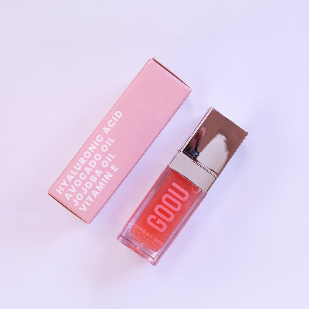 GOOU Beauty Sunday dew lip oil gloss with pink packaging on a white background