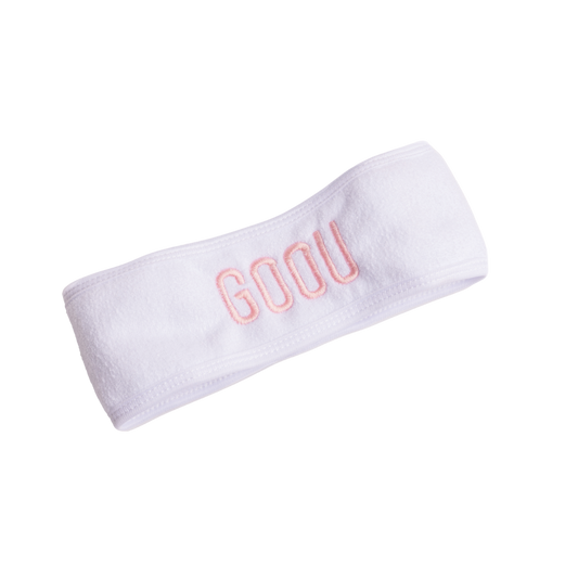 Goou Beauty white spa headband for makeup removing with pink logo on white background